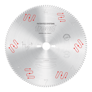Circular saw blade with carbide-tipped teeth around the edge, center arbor hole, and red patented system markings on silver s