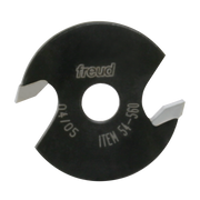 Black circular backcutter blade with central hole, square cutting edges on sides, Freud branding and item number 54-560 visib