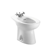 Cotton white bidet with single-hole deck-mounted faucet featuring dual cross handles and chrome spout.