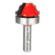 Freud router bit with red ogee groove cutting head, silver shank, and bearing guide.