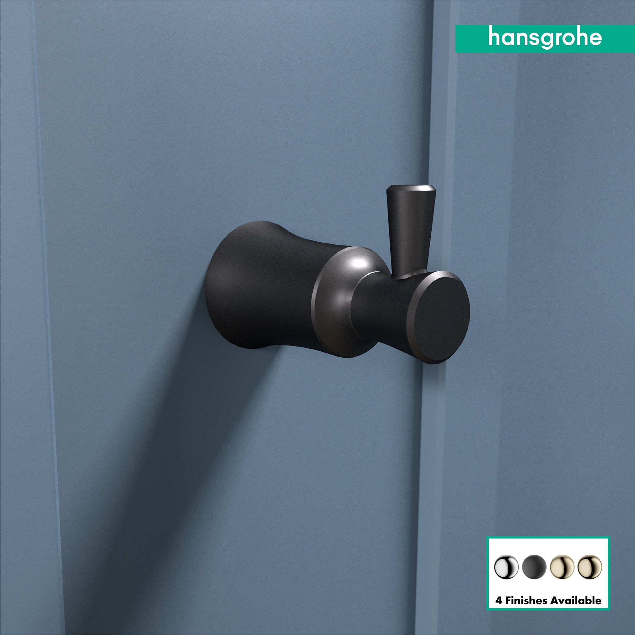 Matte black wall-mounted hook with cylindrical and rounded forms mounted on blue wall.