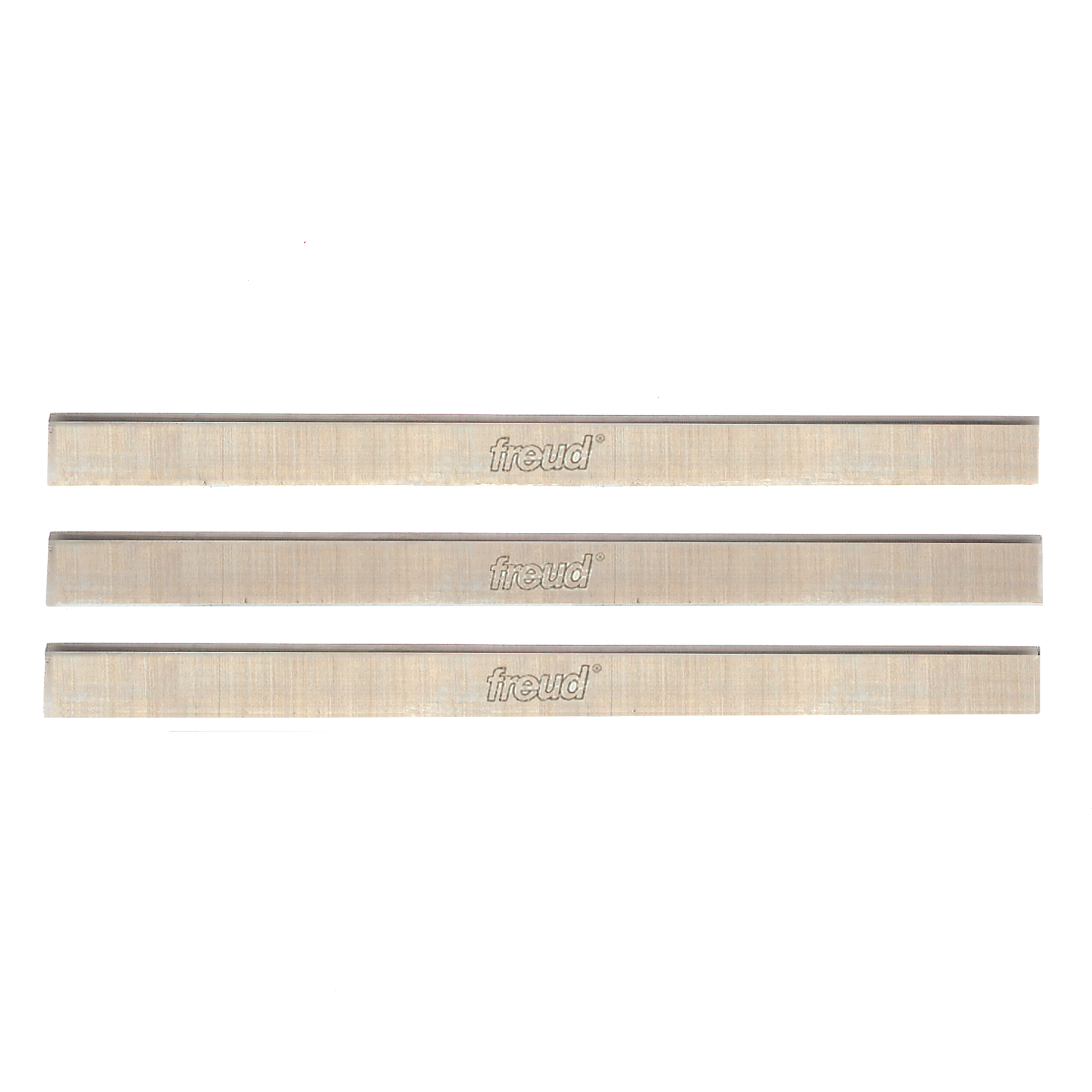 Three Freud high speed steel planer and jointer knives, each 12 inches long with sharp cutting edges.