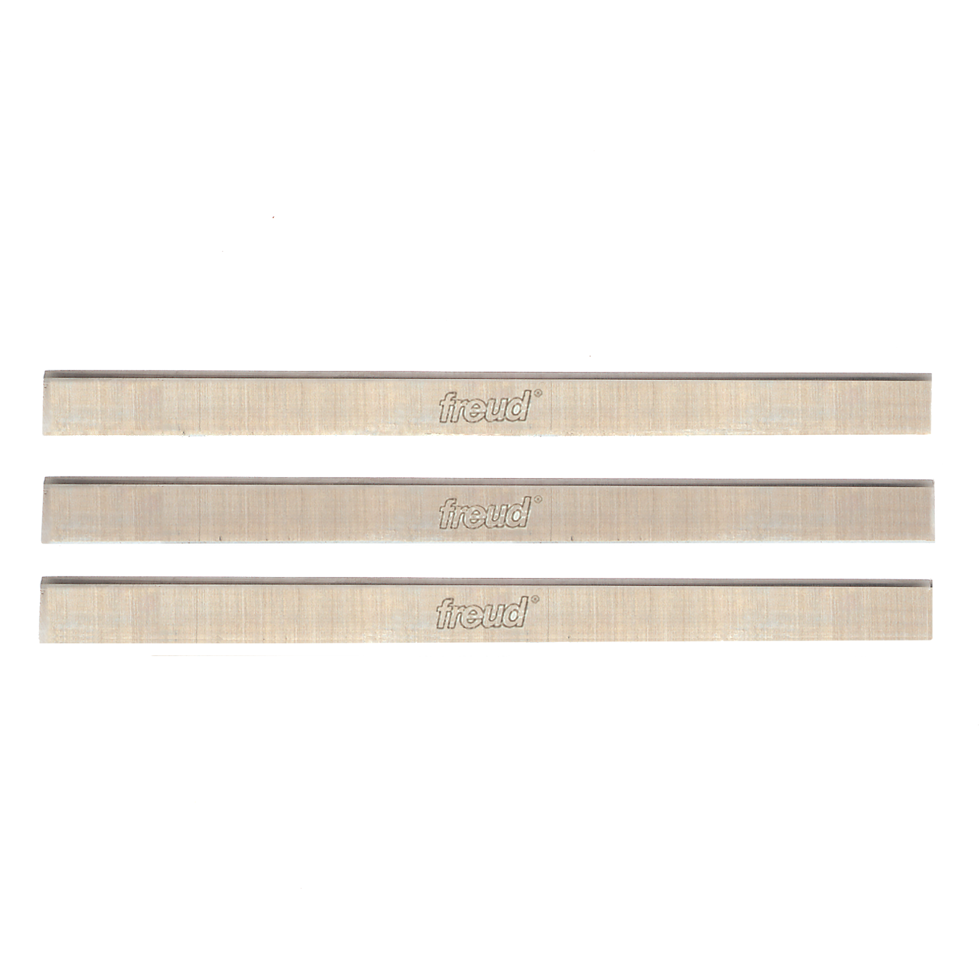 Three Freud high speed steel planer and jointer knives, each 12 inches long with sharp cutting edges.