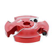 Red router bit with central bore and four cutting profiles, labeled Freud UC203-IC, on white background.