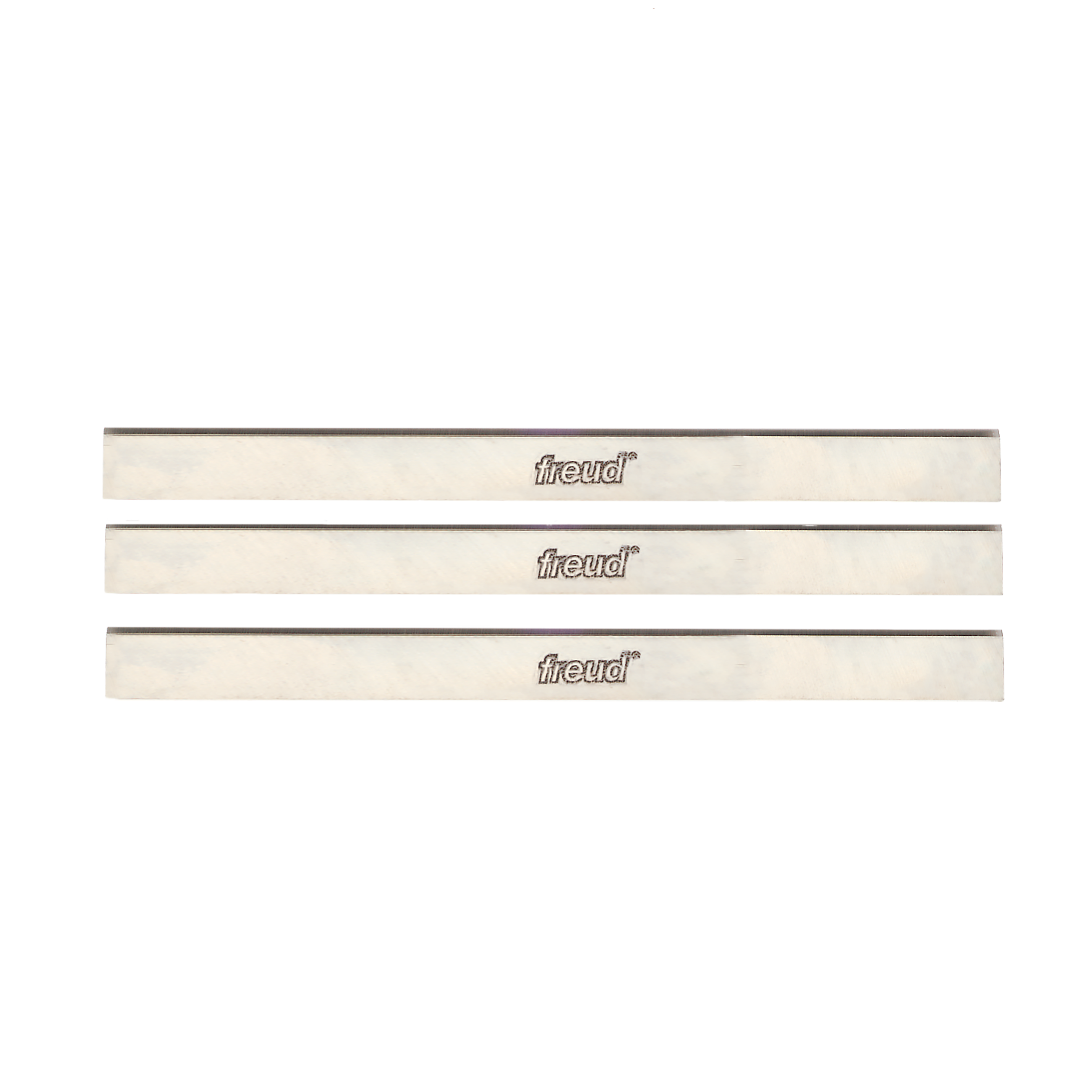 Three Freud 12-inch high speed steel planer and jointer blades with gray cutting edges and cream-colored bodies.