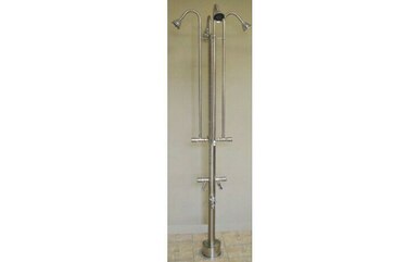 Free-standing metal outdoor shower fixture with four spray heads, curved arms, foot pedal, and hose connection.
