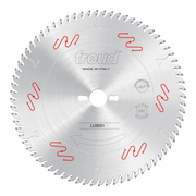 Circular saw blade with silver finish, multiple teeth around perimeter, center arbor hole, and red and white markings on face