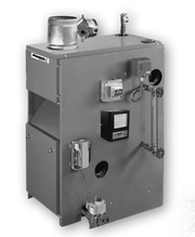Cast iron natural gas boiler with silver cylindrical combustion chamber on top, control panel with gauges and valves on front