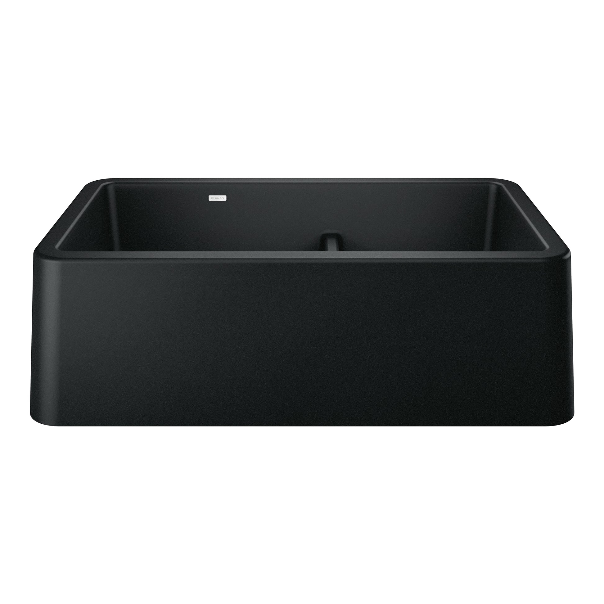 Coal black double bowl farmhouse sink with rounded corners and low center divider.