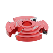 Red router bit with multiple cutting edges and central bore, mounted on white background.