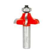 Freud ogee router bit with red cutting head and silver metal shank, featuring rounded decorative profile edge.