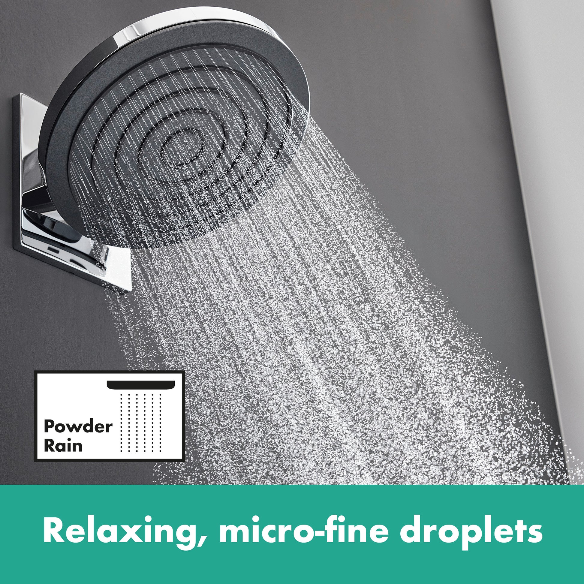 Matte black round shower head with chrome trim mounted on wall, dispensing fine water spray.