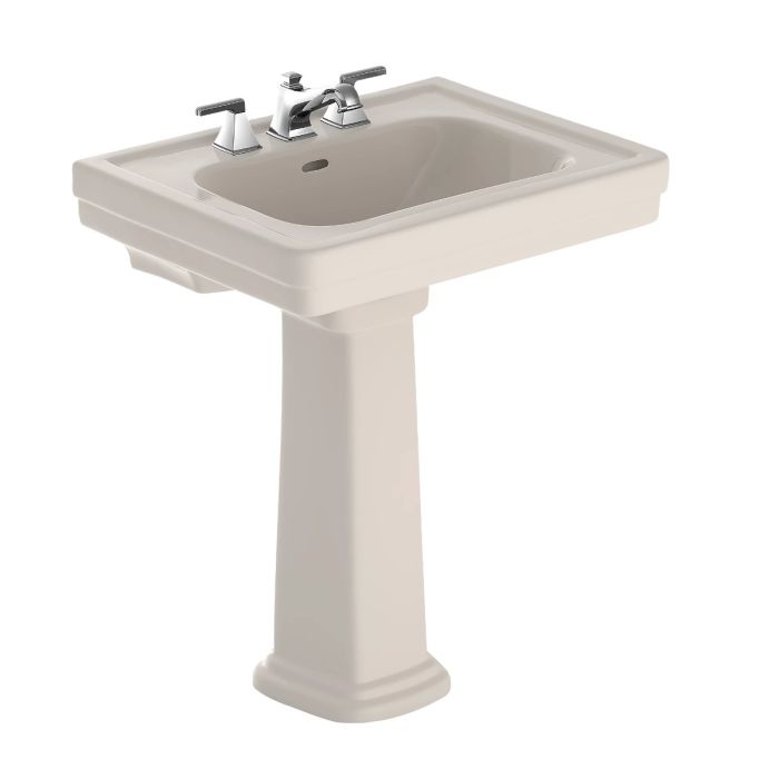 Sedona beige pedestal sink foot with rectangular basin and chrome faucet fixture.