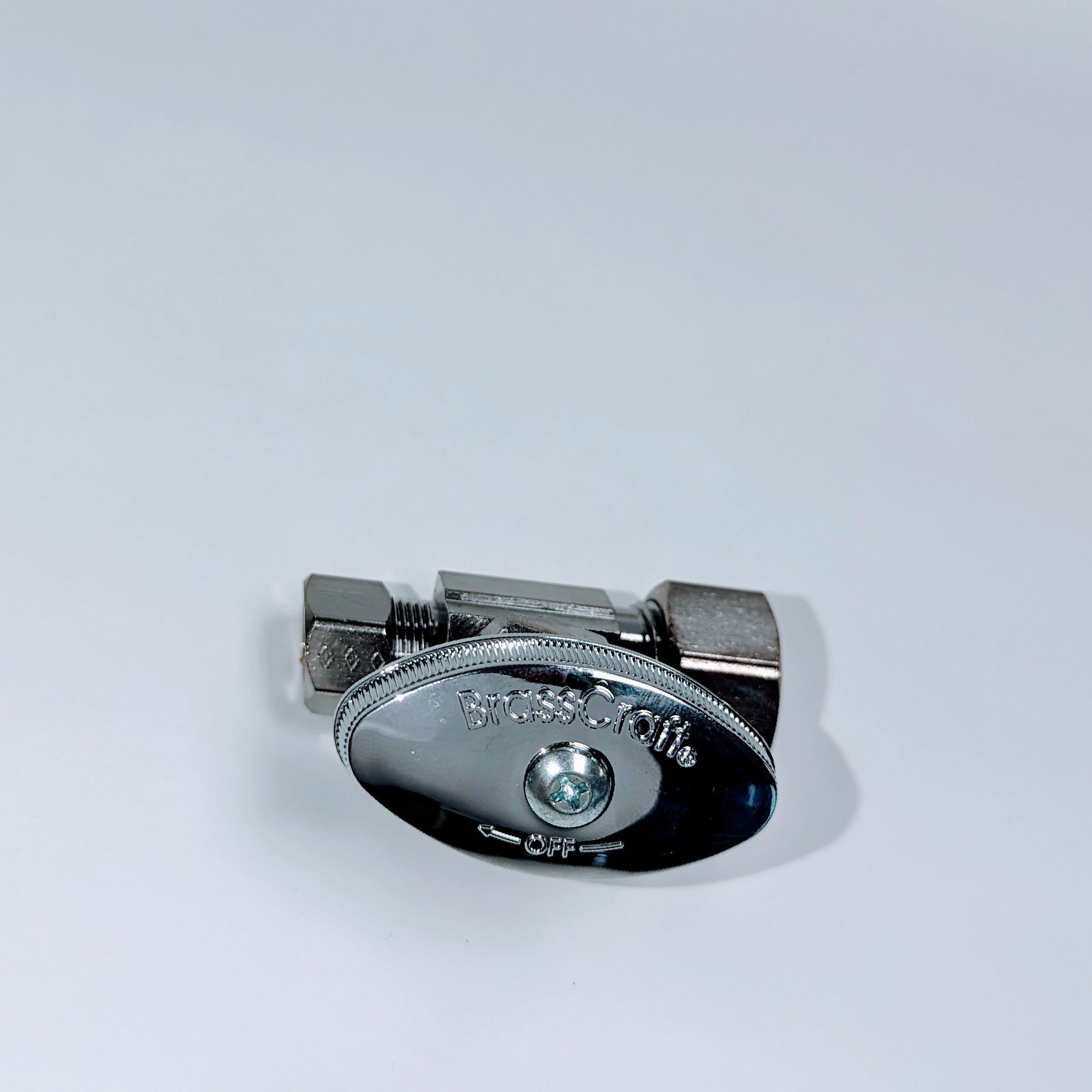 Chrome straight valve with two compression fittings, one larger and one smaller, shown from above against white background.