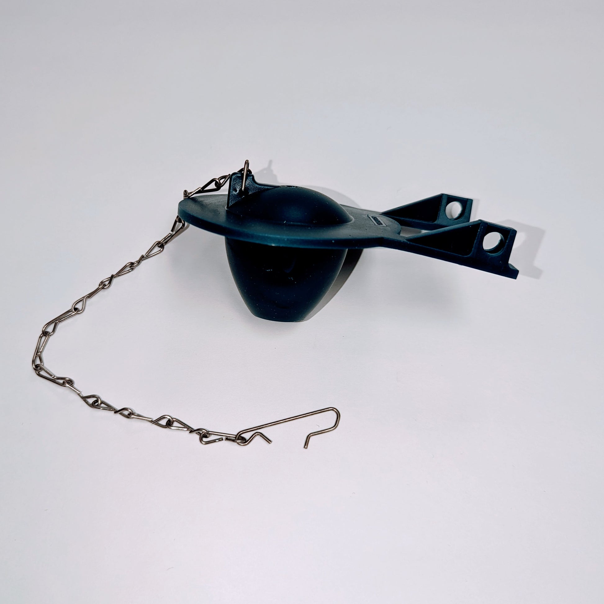 Blue PVC toilet flapper with stainless steel chain and mounting bracket.