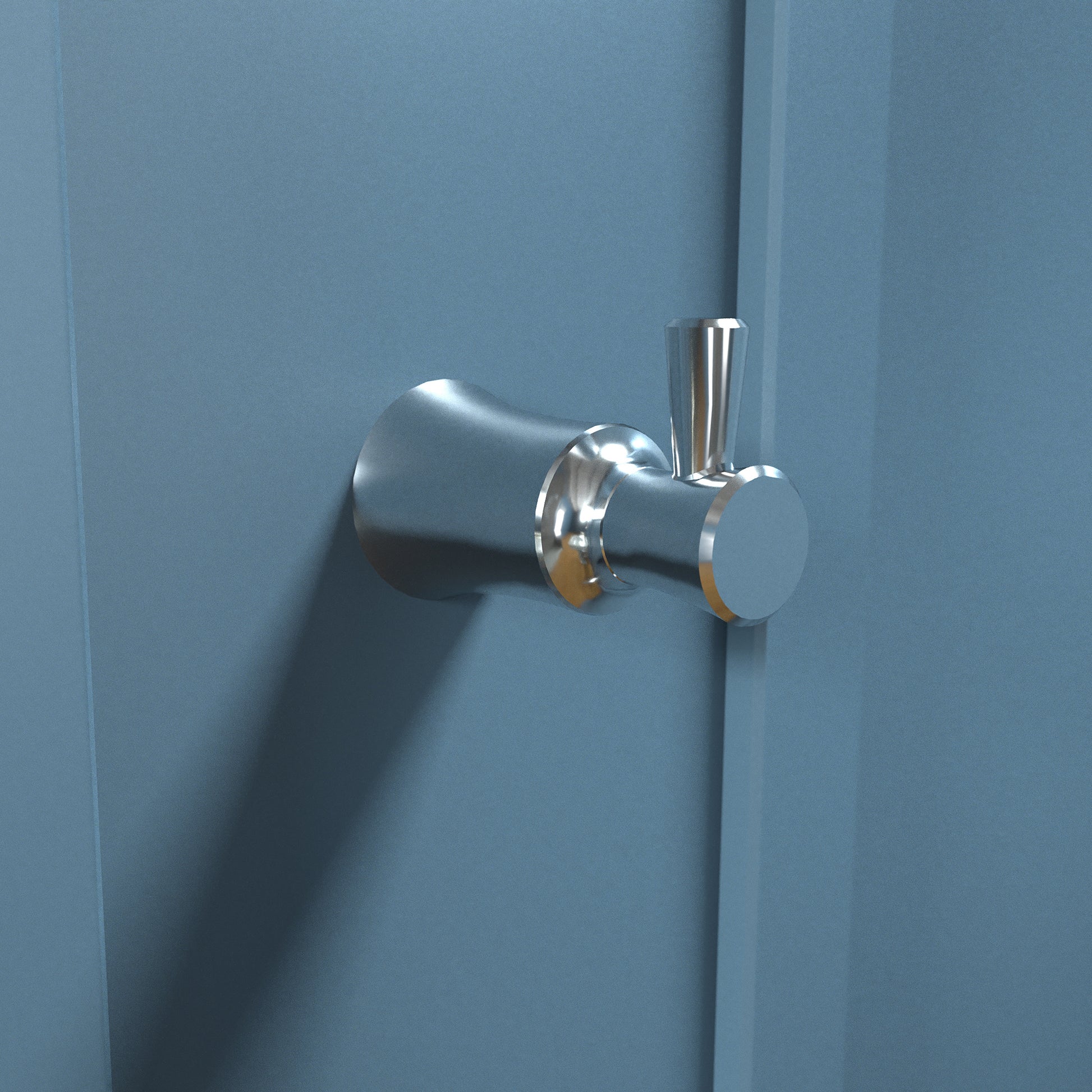 Chrome bathroom hook with cylindrical base and upright post mounted on blue wall.