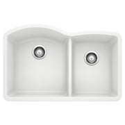 White undermount kitchen sink with two bowls and chrome drain strainers, viewed from above.