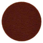 Round reddish-brown non-woven backing pad with textured surface for orbital sanders.