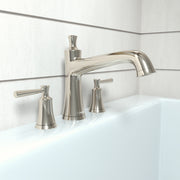 Polished nickel three-hole roman tub faucet set with curved spout and two lever handles mounted on white tile surround.