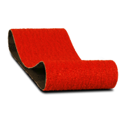 Red abrasive sanding belt with black backing, 3 inches wide by 18 inches long.