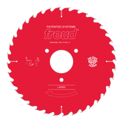 Red circular saw blade with silver teeth, white center hole, and Freud branding and specifications printed on the face.