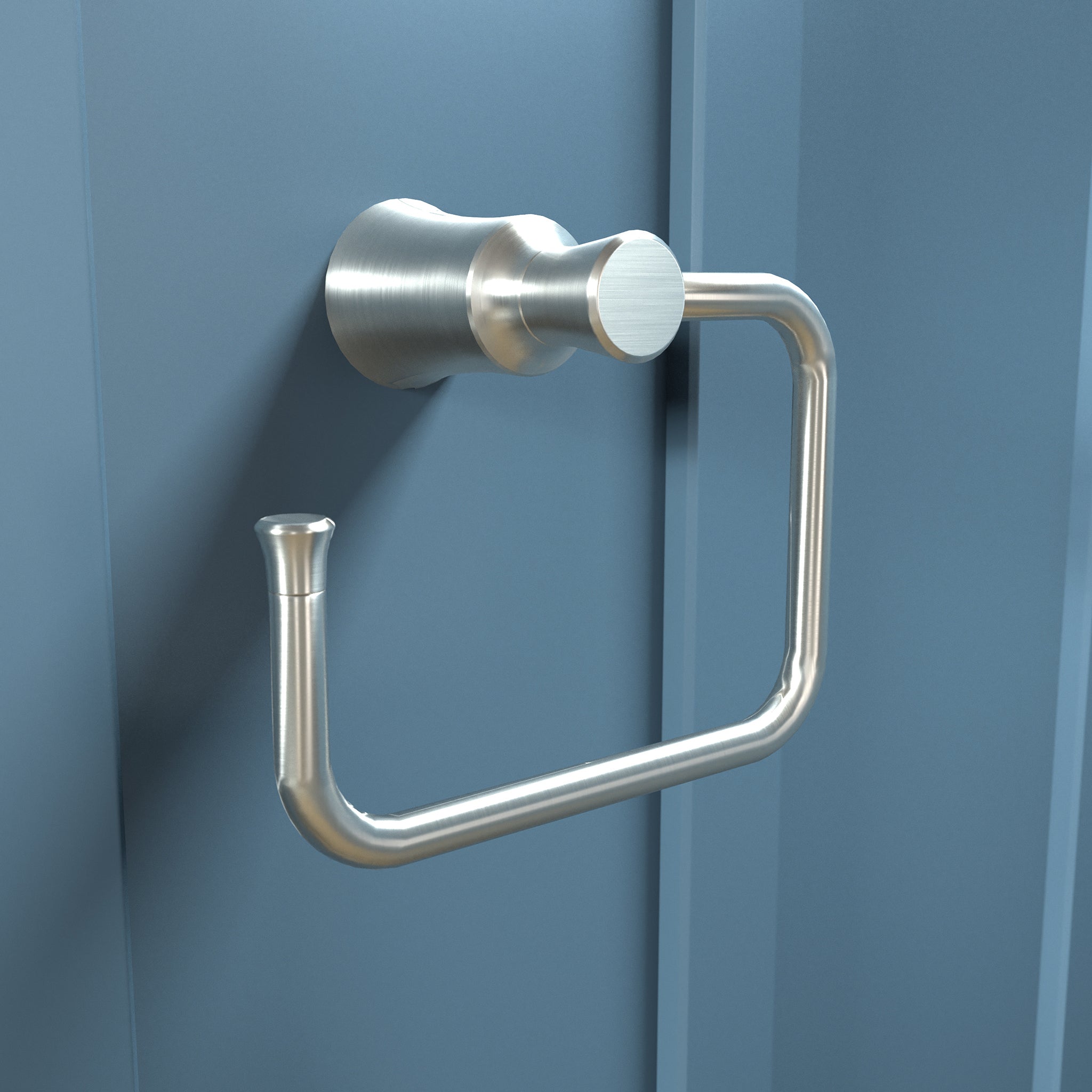 Brushed nickel towel ring with cylindrical wall mount and open rectangular loop design mounted on blue wall.