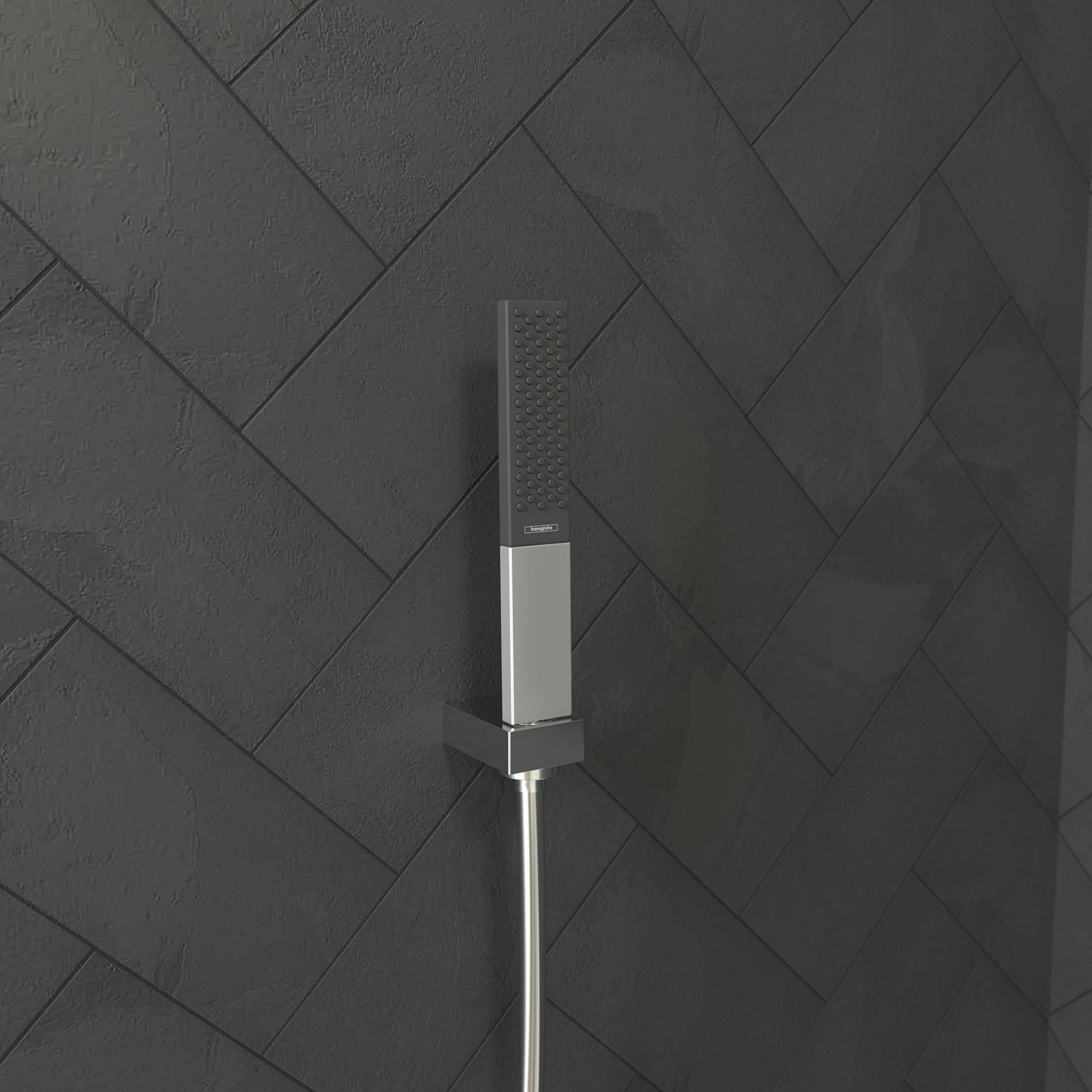 Chrome handheld shower head with rectangular baton design and perforated spray face mounted on wall tile.