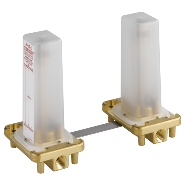 Two brass rough valve bodies with white plastic cartridge housings connected by a metal bar for freestanding tub installation
