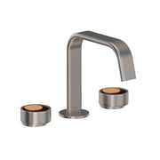 Widespread bathroom faucet with U-shaped spout in satin nickel and satin gold finish with round lever handles.