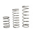 Assorted metal springs and rubber components arranged in rows for valve repair kit.