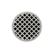 Round satin stainless steel drain cover with quatrefoil pattern and center drain opening.