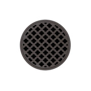 Round oil rubbed bronze drain cover with quatrefoil pattern cutouts, center drain opening.
