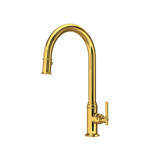Unlacquered brass pull-down kitchen faucet with curved spout and single lever handle.