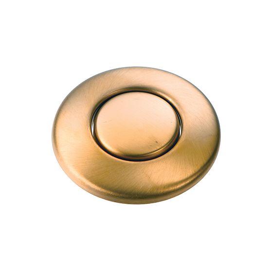 Brushed bronze circular air switch push button with oval center depression on white background.