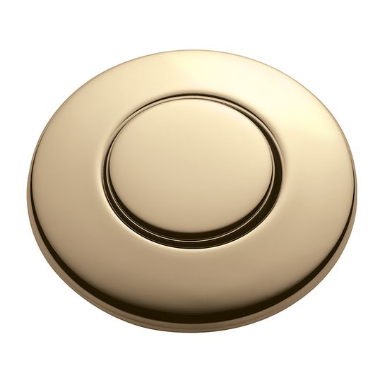 Round French gold air switch button with recessed center and outer rim for sink-mounted installation.
