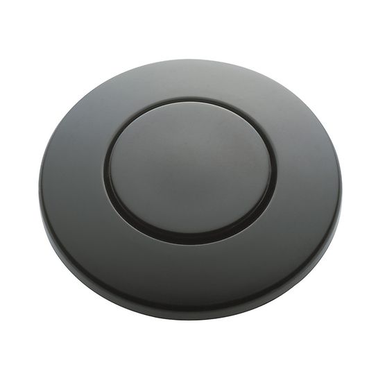Black circular push button air switch with recessed center button and outer ring.