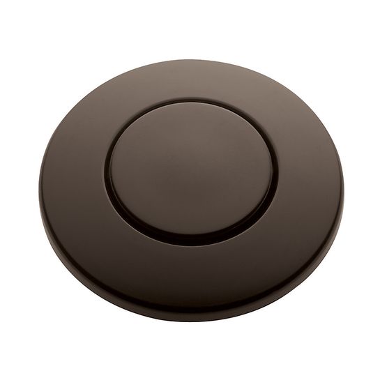 Oil rubbed bronze circular push button air switch with recessed center button on round mounting plate.