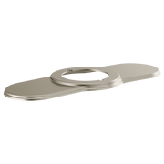 Luxe nickel lavatory escutcheon with elongated base plate and circular opening.