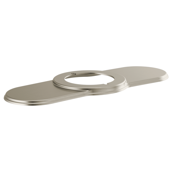Luxe nickel lavatory escutcheon with elongated base plate and circular opening.