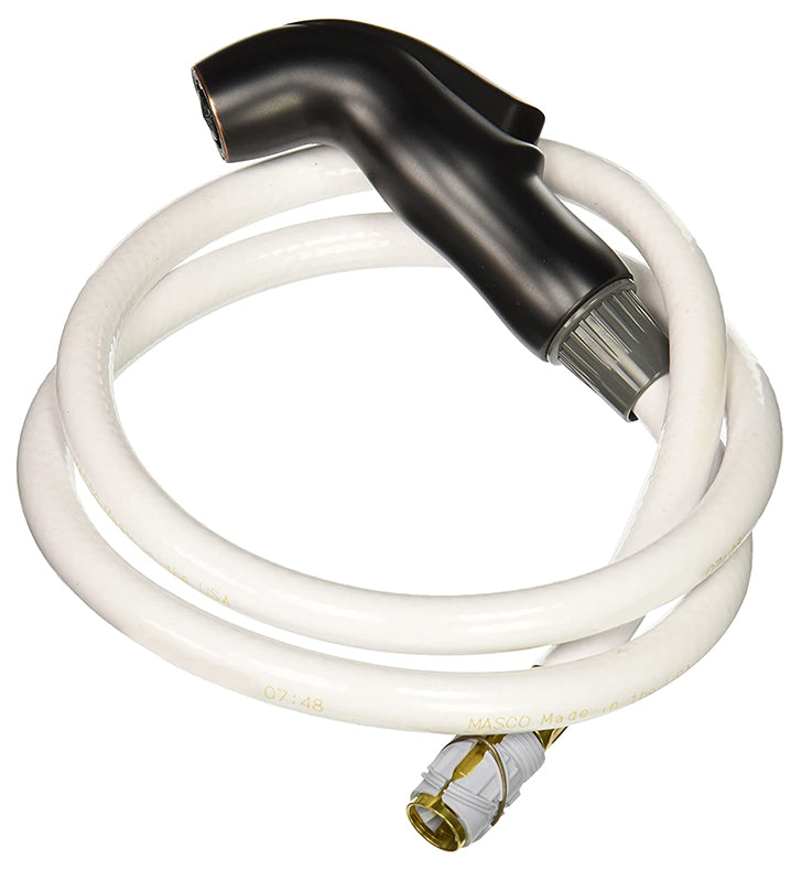 Oil rubbed bronze kitchen sprayer with white hose and brass connector fitting.