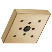 Champagne bronze square raincan shower head with multiple water jets and Delta logo in center.