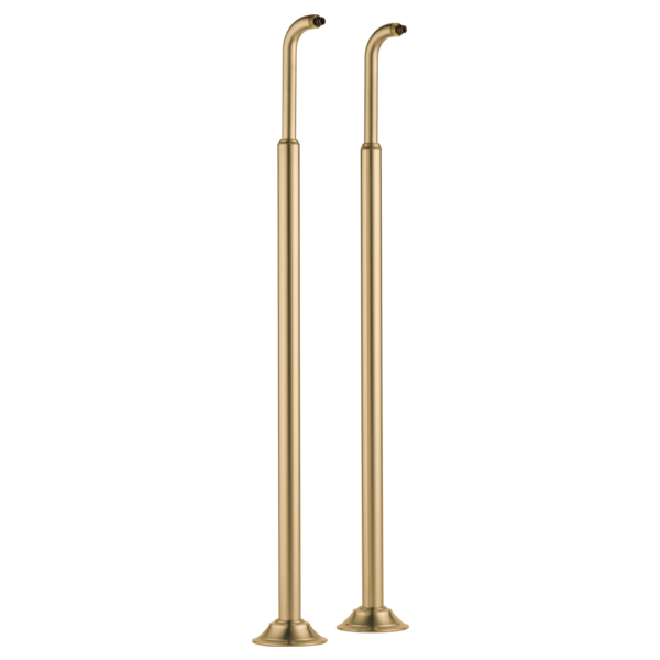 Pair of tall gold metal tub filler risers with curved spouts and circular base feet.