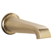 Luxe gold tub spout with curved tapered design and wall-mounted circular flange.