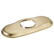Gold-toned lavatory escutcheon with elongated oval shape and central circular opening for pipe connection.