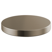 Stainless steel circular hole cover with brushed finish and raised edge rim.
