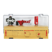 Three router bits with cove and bead profiles in clear plastic case with wood base and instruction diagrams.