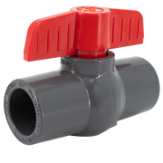 Gray PVC ball valve with red lever handle and slip-fit ends.