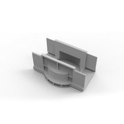 Gray plastic linear drain component with curved channel and rectangular mounting flanges on sides.