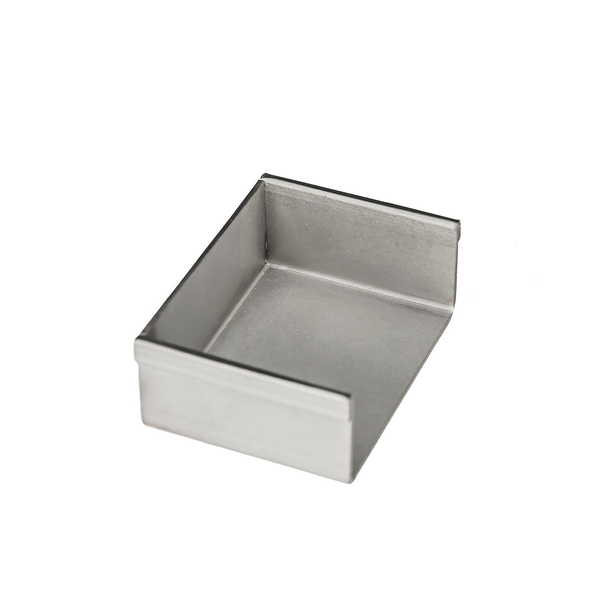 Satin stainless steel linear drain component with rectangular basin and sloped interior walls.