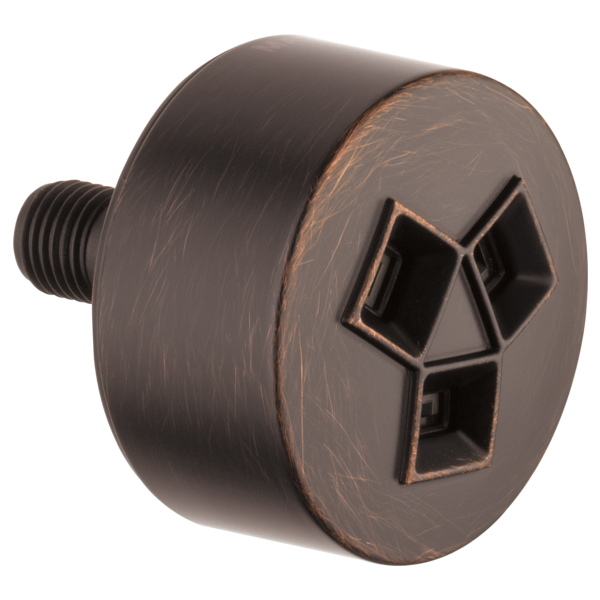 Circular bronze showerhead with geometric cutout pattern and threaded connector on left side.